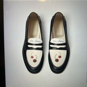 Chic Black and White Loafers with Cherry Detail
